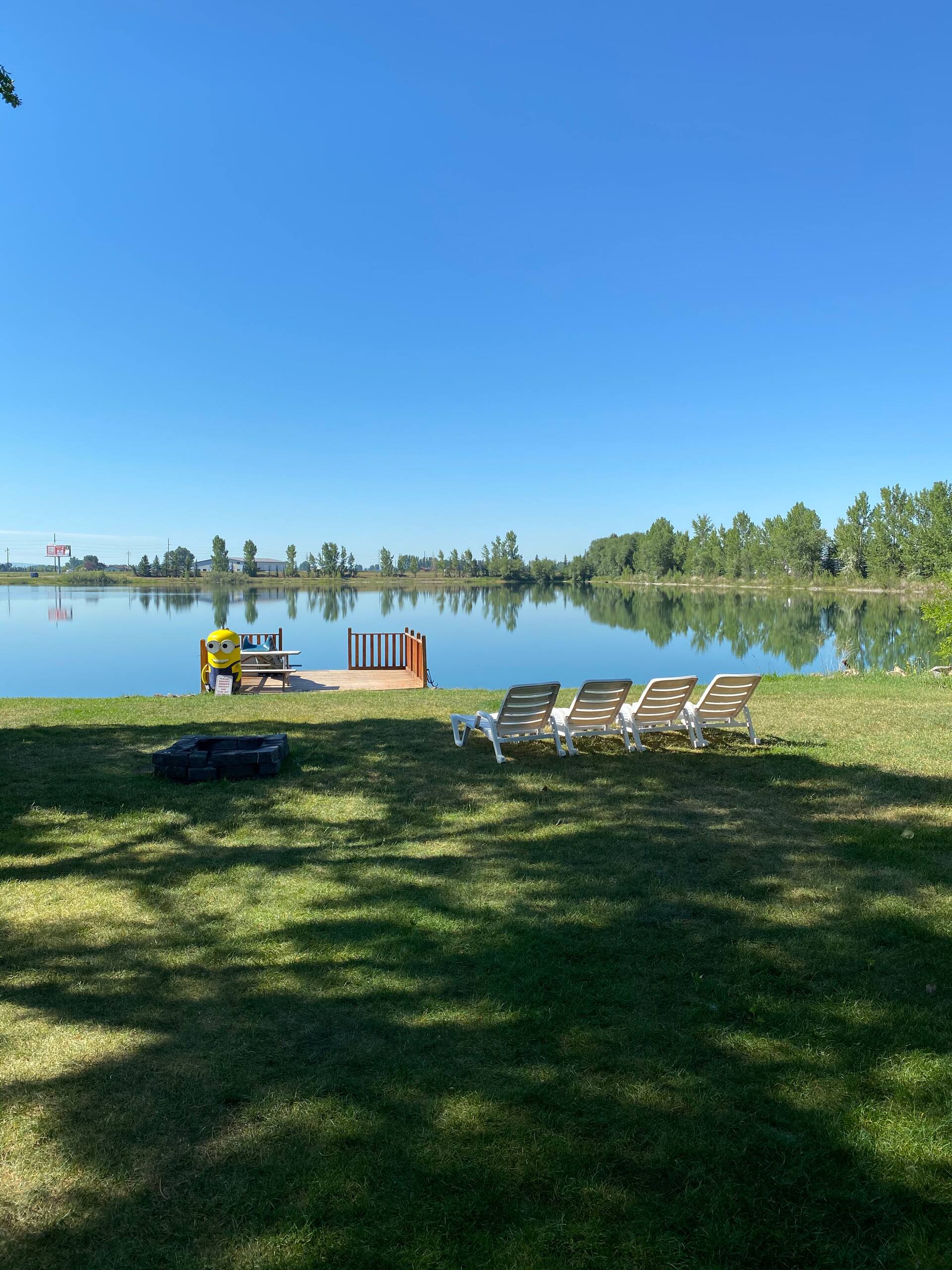 Lawn running down to the water's edge