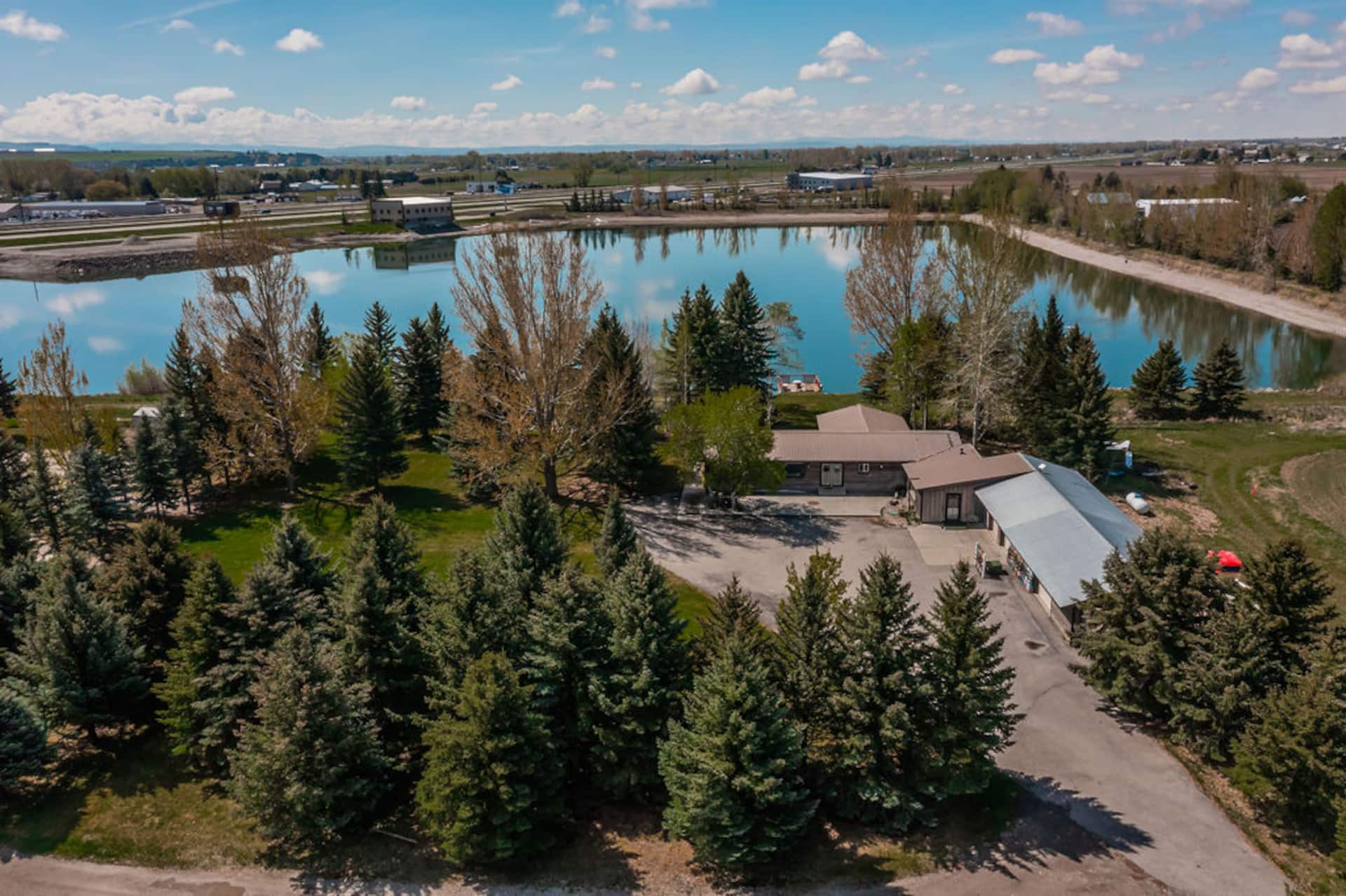 Aerial view of the 33-acre private lake and property