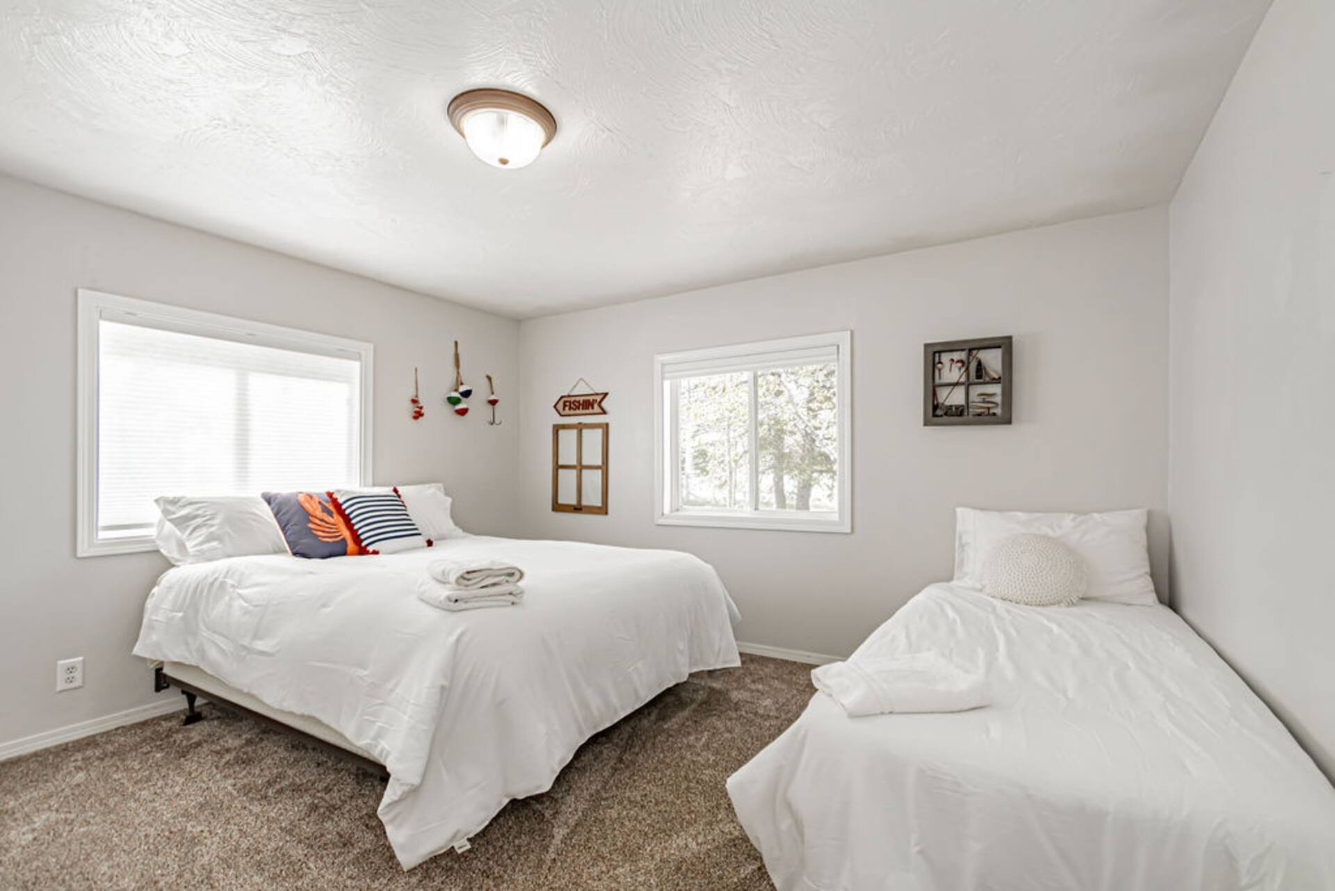 Bedroom Two — 1 queen · 1 twin