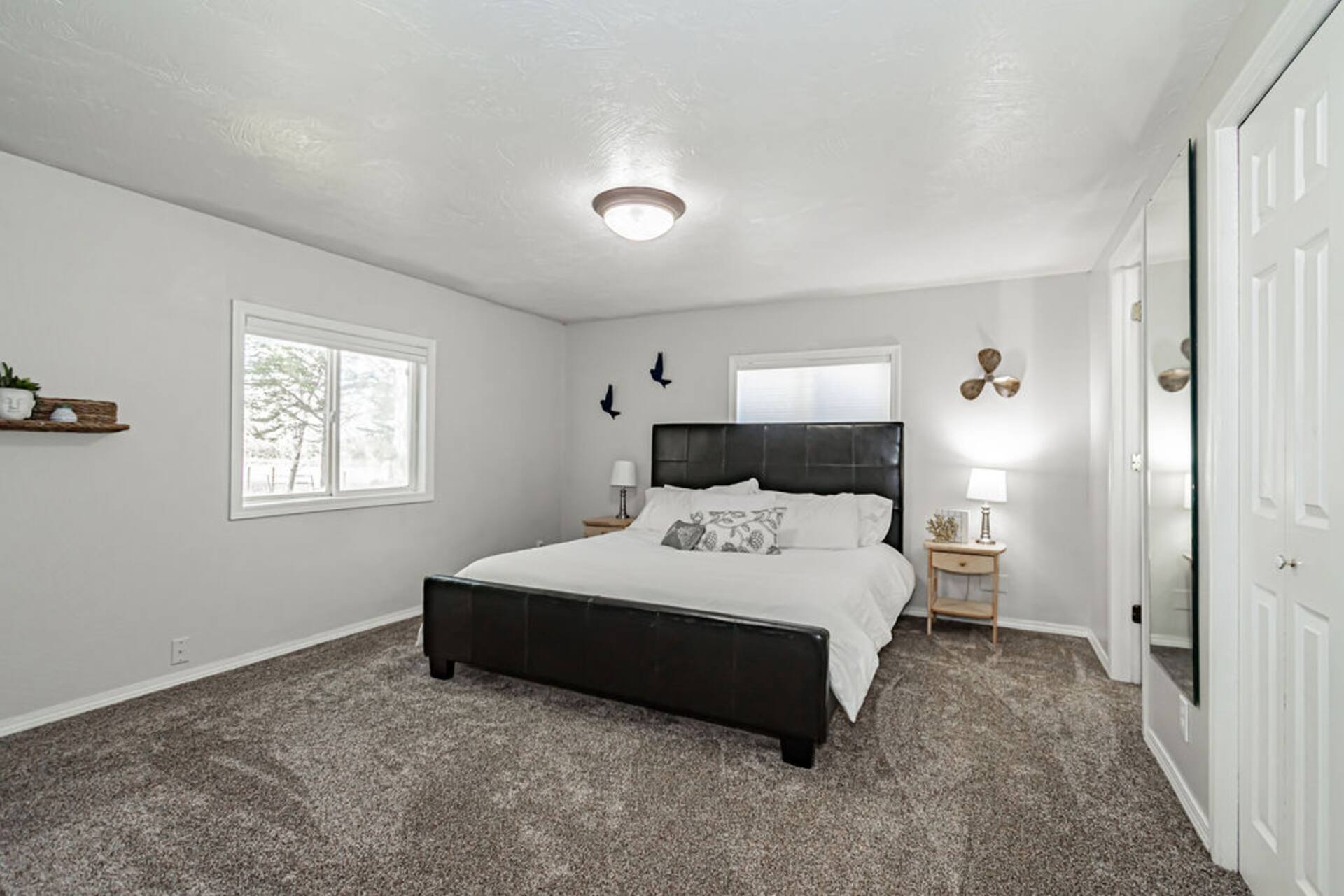 King bedroom with lake-house styling