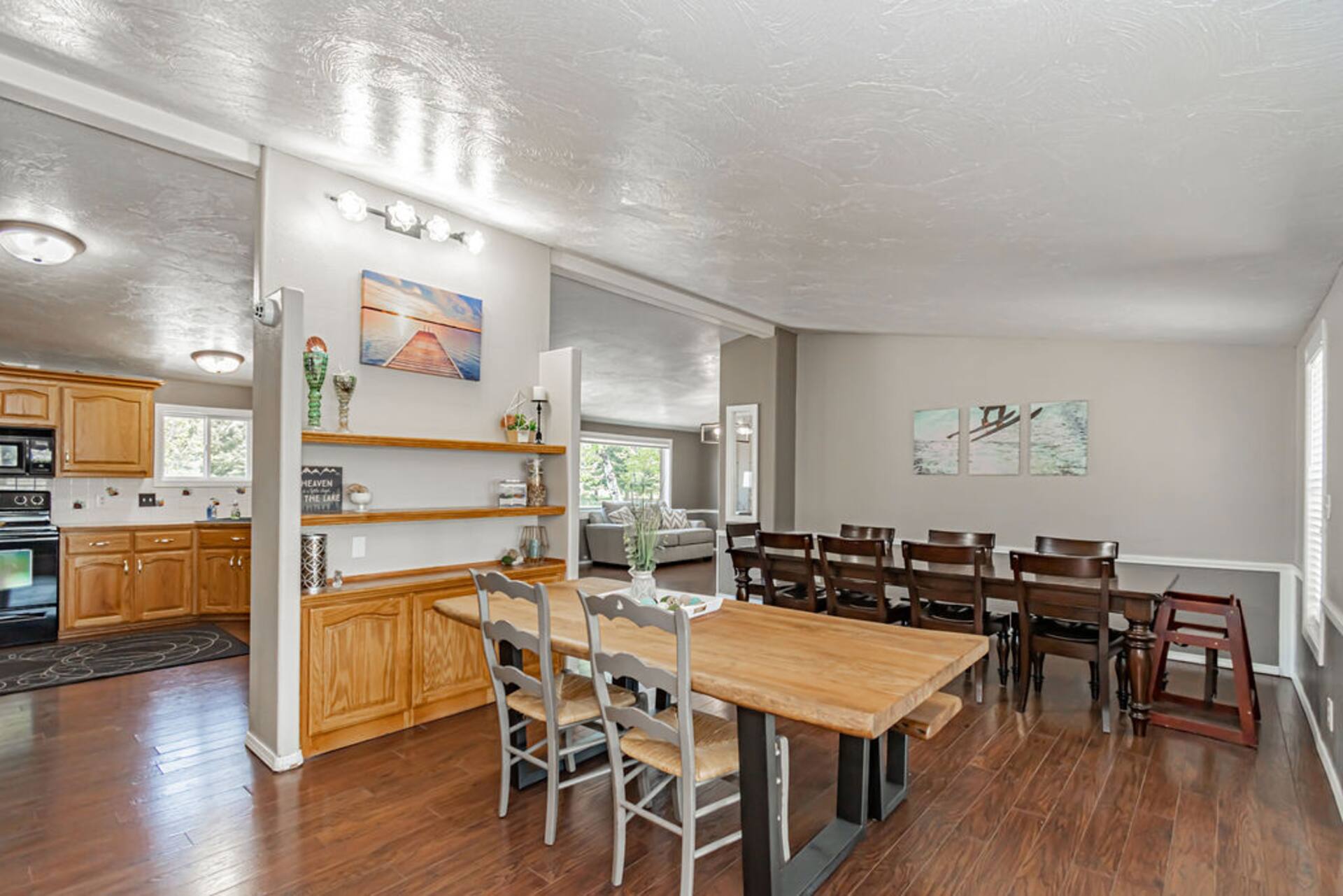 Kitchen opening onto the long dining table